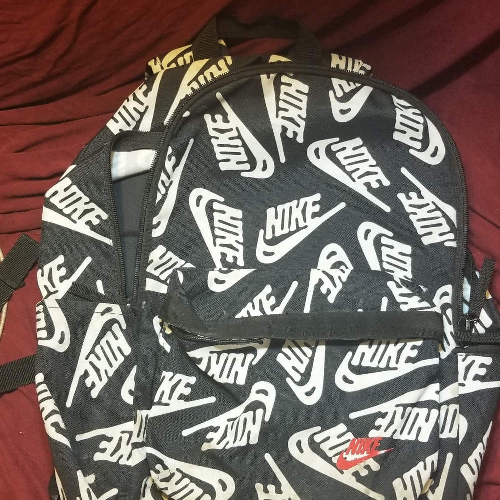 White and black Nike backpack